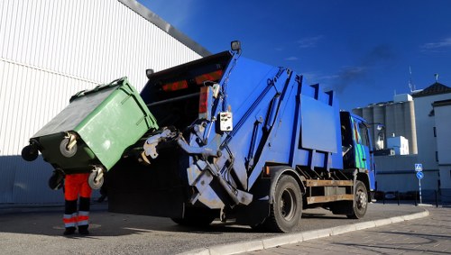 Vans outside a commercial premises in Hackbridge ready for waste removal